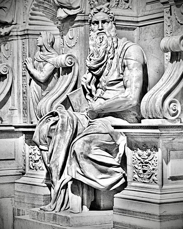 Moses - A marble sculpture by Renaissance artist Michelangelo Buonarotti, commissioned by Pope Julius II for his tomb, is located in St. Peter's Basilica in Viccoli, Rome, Italy. (Black and white)